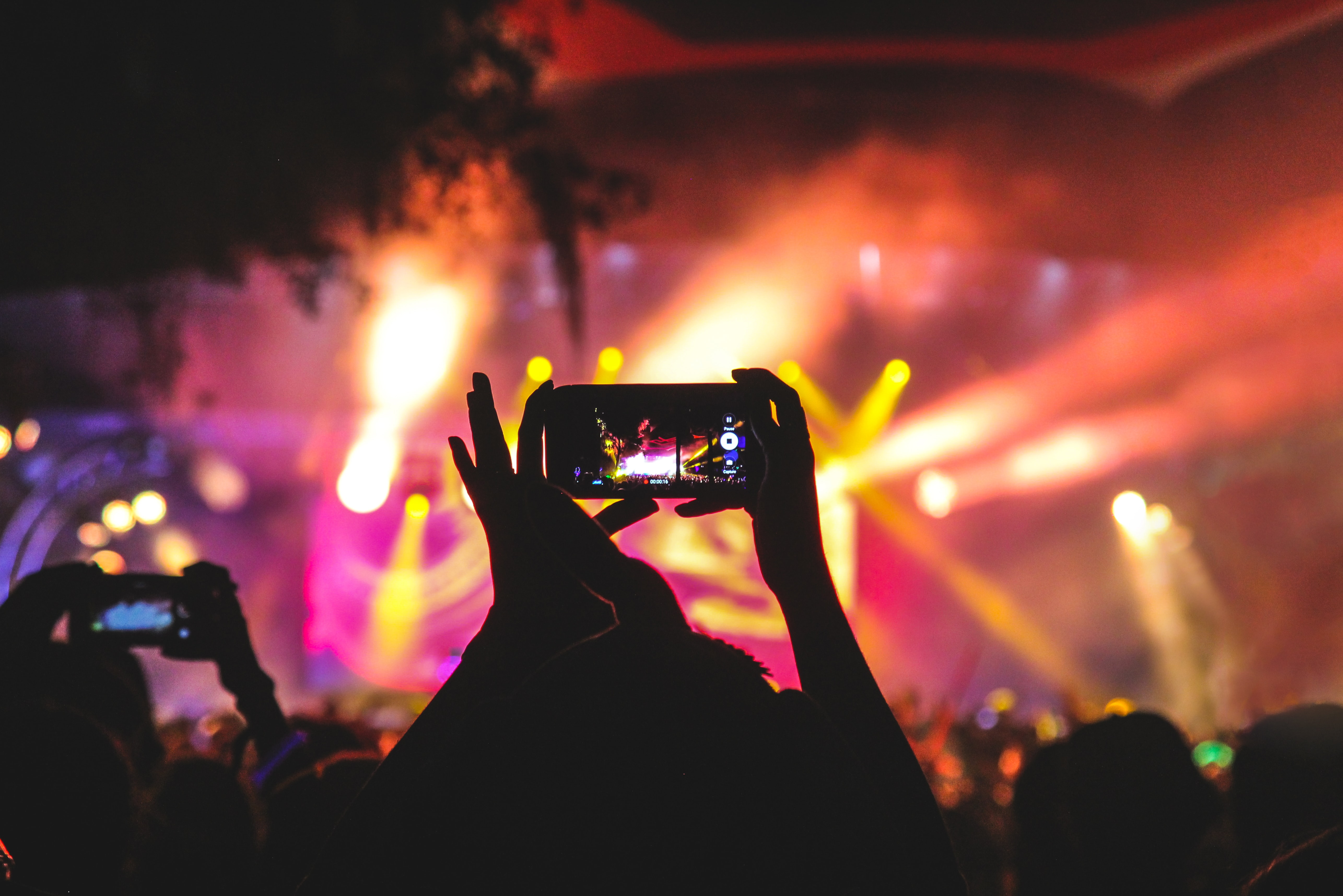 audience capturing moment of the stage